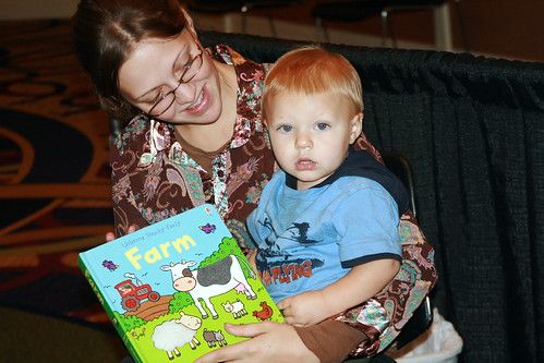 Reading a Book at the Chaffin Family Orchards Booth