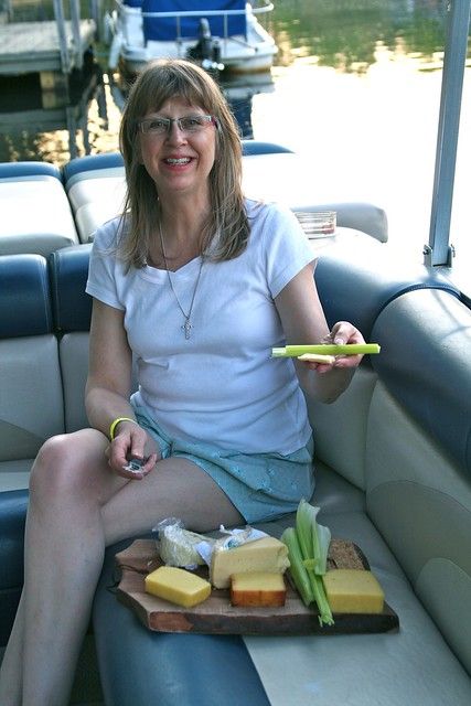 Kimberly Hartke, feeding me cheese on her boat