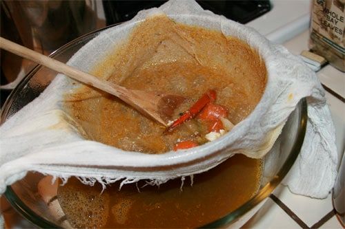 straining lobster stock